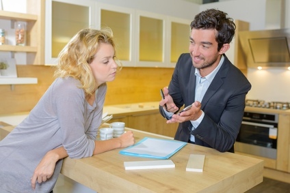 Woman in discussion with salesman photo : Woman in discussion with salesman