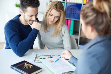 Couple visiting estate agents office photo : Couple visiting estate agents office