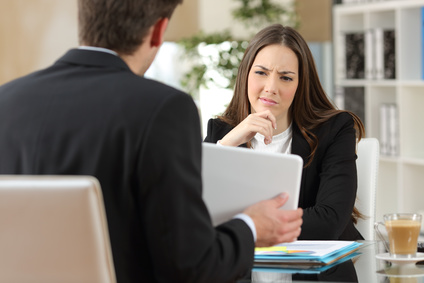 Salesman trying to convince a doubtful customer photo : Salesman trying to convince a doubtful customer