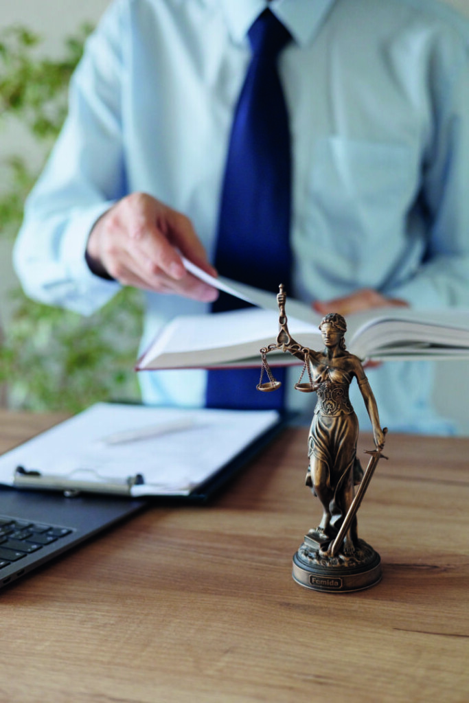 photo : male lawyer at a meeting with a client, legal advice online. resolution of disputes of the family code during