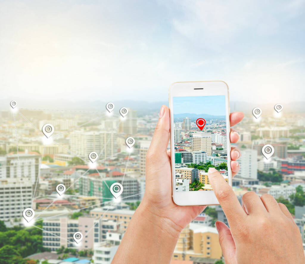 photo : female hands holding a smart phone showing part of navigator map. Navigation concept.